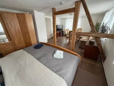 Ein Bett oder Betten in einem Zimmer der Unterkunft Ferienwohnung Lippmann