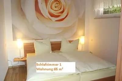 Ein Bett oder Betten in einem Zimmer der Unterkunft Ferienwohnung Gohrisch Ambiente