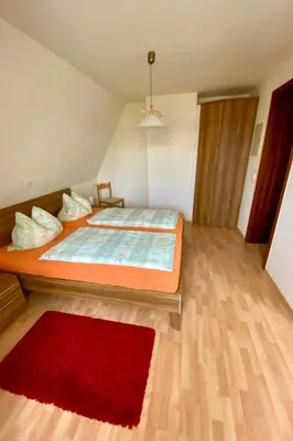 Ein Bett oder Betten in einem Zimmer der Unterkunft Apartment Kamelienweg by Interhome