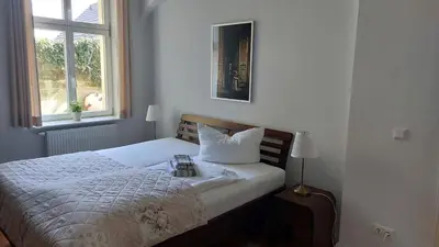 Ein Bett oder Betten in einem Zimmer der Unterkunft Villa Norma