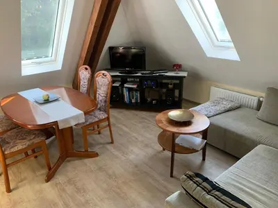 Ein Sitzbereich in der Unterkunft Ferienwohnung Pirna - [#a44102]