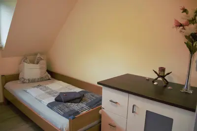 Ein Bett oder Betten in einem Zimmer der Unterkunft Ferienwohnung Pirna - [#a44102]