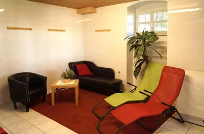 Ein Sitzbereich in der Unterkunft Villa Unger