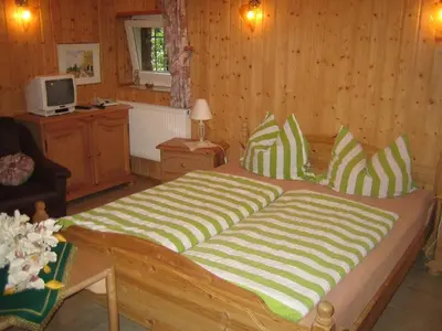 Ein Bett oder Betten in einem Zimmer der Unterkunft Pension Elbblick Sabine Zuschke