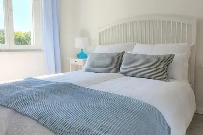 Ein Bett oder Betten in einem Zimmer der Unterkunft PB Ferienwohnungen - FeWo 5 - Stilvoll eingerichtetes Studio im Herzen Senftenbergs