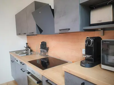 Küche/Küchenzeile in der Unterkunft PB Ferienwohnungen - FeWo 2 - Stilvoll eingerichtetes Apartment im Herzen Senftenbergs