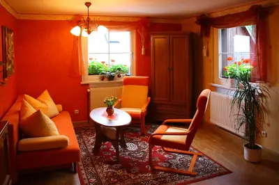 Ein Sitzbereich in der Unterkunft Haus Tadeus