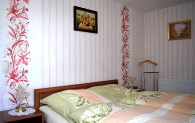 Ein Bett oder Betten in einem Zimmer der Unterkunft Haus Tadeus