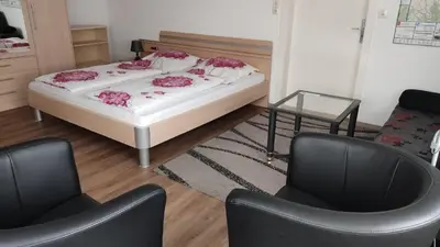 Ein Bett oder Betten in einem Zimmer der Unterkunft Ferienwohnung Schaarschmidt