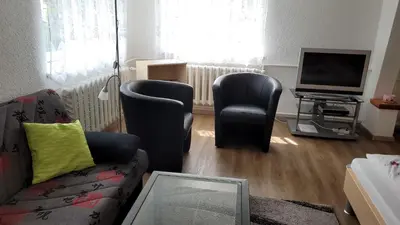 Ein Sitzbereich in der Unterkunft Ferienwohnung Schaarschmidt
