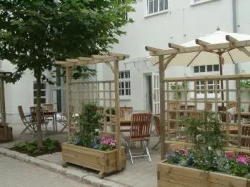 Ein Restaurant oder anderes Speiselokal in der Unterkunft Hotel Döbelner Hof