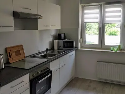 Küche/Küchenzeile in der Unterkunft Ferienhaus Rosmarie am Elbradweg