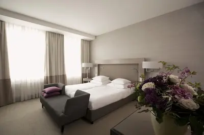 Ein Bett oder Betten in einem Zimmer der Unterkunft Townhouse Dresden