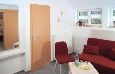 Ein Sitzbereich in der Unterkunft Erzgebirgshotel Misnia Bärenfels