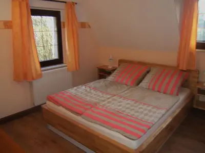 Ein Bett oder Betten in einem Zimmer der Unterkunft Doppelzimmer Liliensteinblick 1.OG