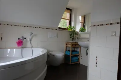 Ein Badezimmer in der Unterkunft Doppelzimmer Liliensteinblick 1.OG