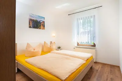 Ein Bett oder Betten in einem Zimmer der Unterkunft 4-Bettzimmer Sächsische Schweiz