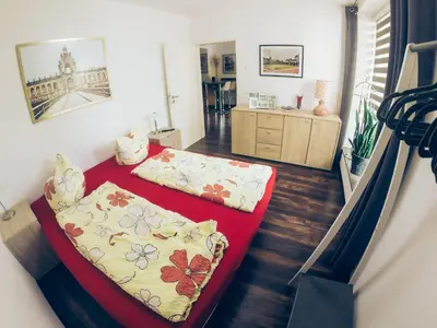 Ein Bett oder Betten in einem Zimmer der Unterkunft Ferienwohnung