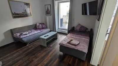 Ein Bett oder Betten in einem Zimmer der Unterkunft Ferienwohnung