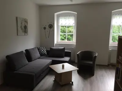 Ein Sitzbereich in der Unterkunft Ferienwohnung Uhlig