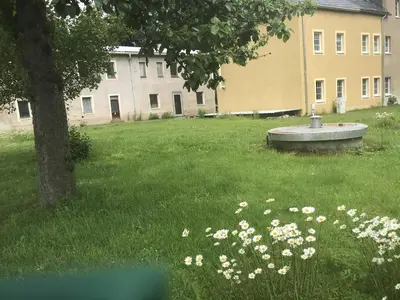 Ein Garten an der Unterkunft Ferienwohnung Uhlig