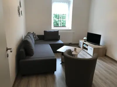 Ein Sitzbereich in der Unterkunft Ferienwohnung Uhlig