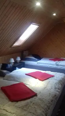 Ein Bett oder Betten in einem Zimmer der Unterkunft Ferienwohnungen Langer