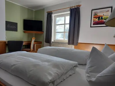Ein Bett oder Betten in einem Zimmer der Unterkunft Hotel Zum Poppschen Gut