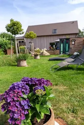 Ein Garten an der Unterkunft Ferienwohnung 1