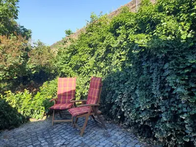 Ein Garten an der Unterkunft Unterkunft am Weinberg