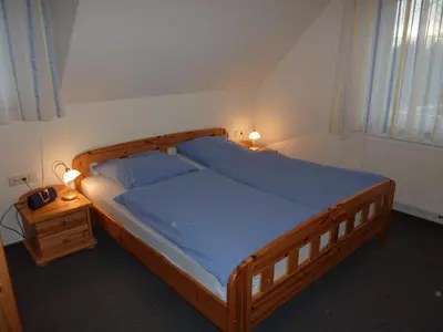Ein Bett oder Betten in einem Zimmer der Unterkunft Ferienwohnung Cafe`Rotter , Brigitte und Jürgen Rotter