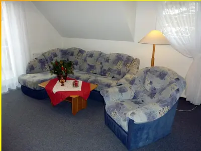 Ein Sitzbereich in der Unterkunft Ferienwohnung Cafe`Rotter , Brigitte und Jürgen Rotter