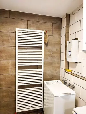 Ein Badezimmer in der Unterkunft Bungalow Alex