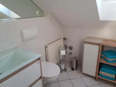 Ein Badezimmer in der Unterkunft Ferienwohnung Willkommen