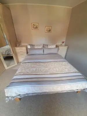 Ein Bett oder Betten in einem Zimmer der Unterkunft Ferienwohnung Morgensonne Kurort Rathen