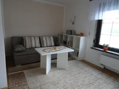 Ein Sitzbereich in der Unterkunft Ferienhaus Dampferblick