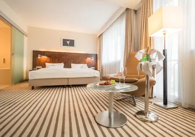 Ein Bett oder Betten in einem Zimmer der Unterkunft Hotel an der Oper