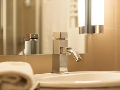 Ein Badezimmer in der Unterkunft Hotel an der Oper