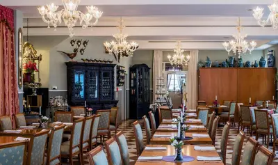 Ein Restaurant oder anderes Speiselokal in der Unterkunft Sebnitzer Hof by STEIGER Hotels