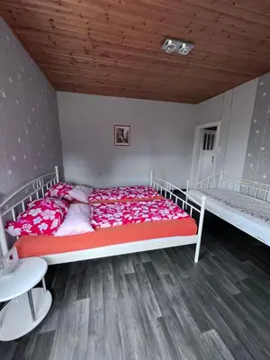 Ein Bett oder Betten in einem Zimmer der Unterkunft Ferienwohnung Bella in Heidenau bei Dresden