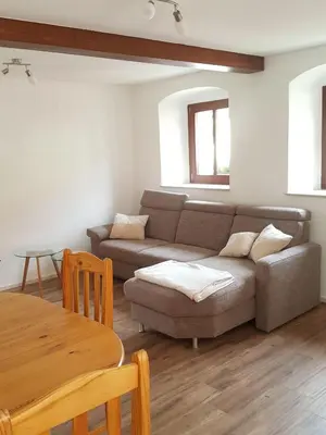 Ein Sitzbereich in der Unterkunft Ferienwohnung Max 22