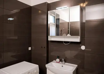 Ein Badezimmer in der Unterkunft Apartmenthaus Sternstraße 6