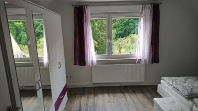 Ein Bett oder Betten in einem Zimmer der Unterkunft Haus Waldidyll