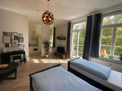 Ein Bett oder Betten in einem Zimmer der Unterkunft Ferienwohnung König Georg