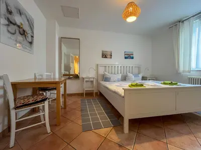 Ein Bett oder Betten in einem Zimmer der Unterkunft Wohnperle Elbtal - Dresden erleben und genießen