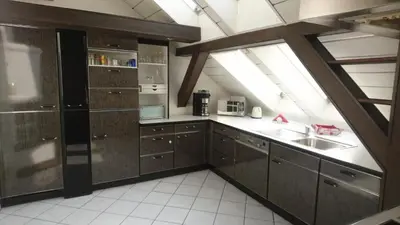 Küche/Küchenzeile in der Unterkunft Penthouse Himmelreich großzügige Maisonette auf 152 qm mit Klima & Kamin