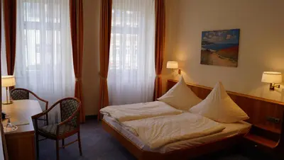 Ein Bett oder Betten in einem Zimmer der Unterkunft Hotel Goldener Löwe