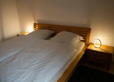 Ein Bett oder Betten in einem Zimmer der Unterkunft Elbtal-Apartment de