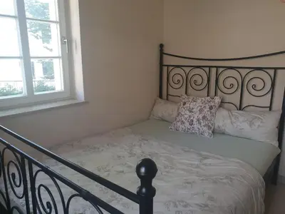 Ein Bett oder Betten in einem Zimmer der Unterkunft Das Gäste Haus