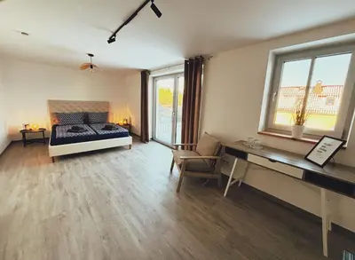 Ein Sitzbereich in der Unterkunft Parkschlößchen Hotel